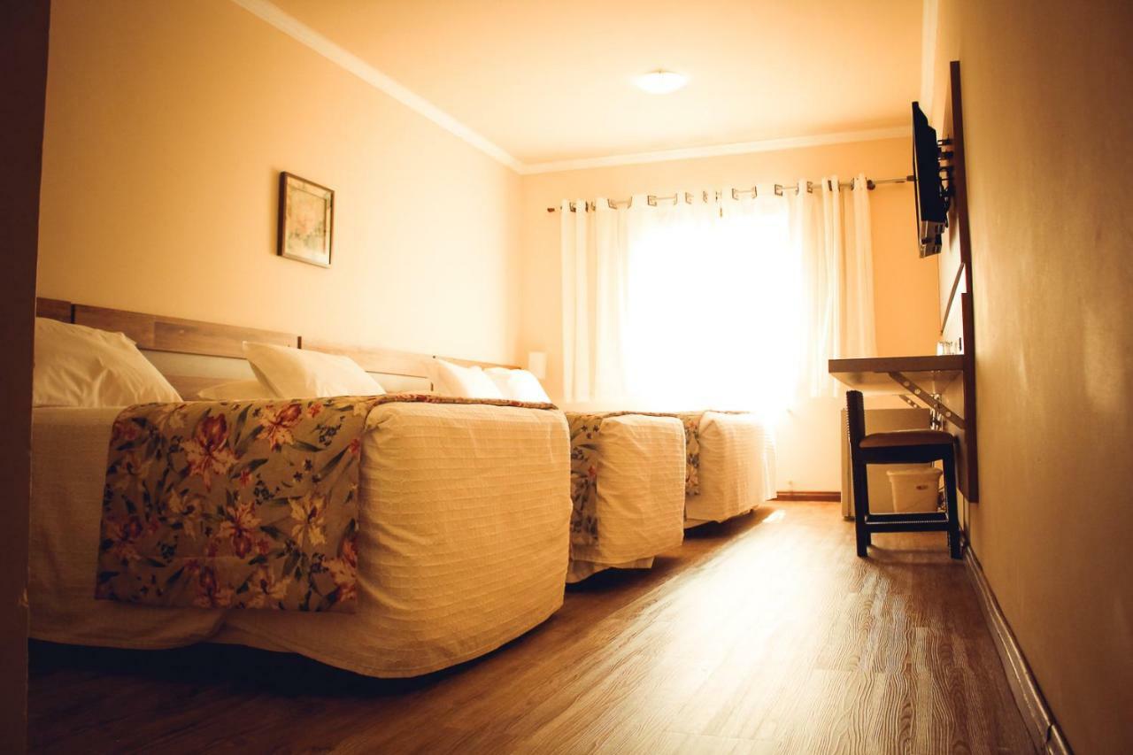 Quarto Quádruplo Luxo